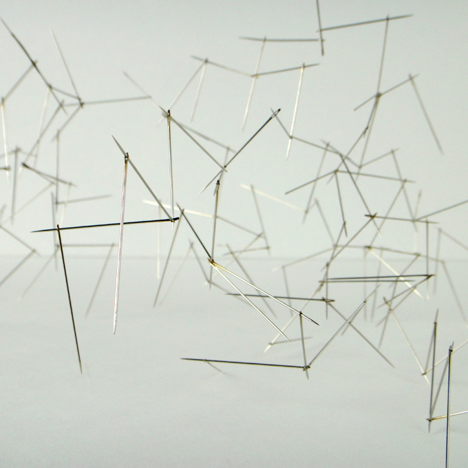 <b>Structure I</b> (detail)<br>
Needles inserted one into the other<br>
20 x 43 x 34 cm<br>
2011