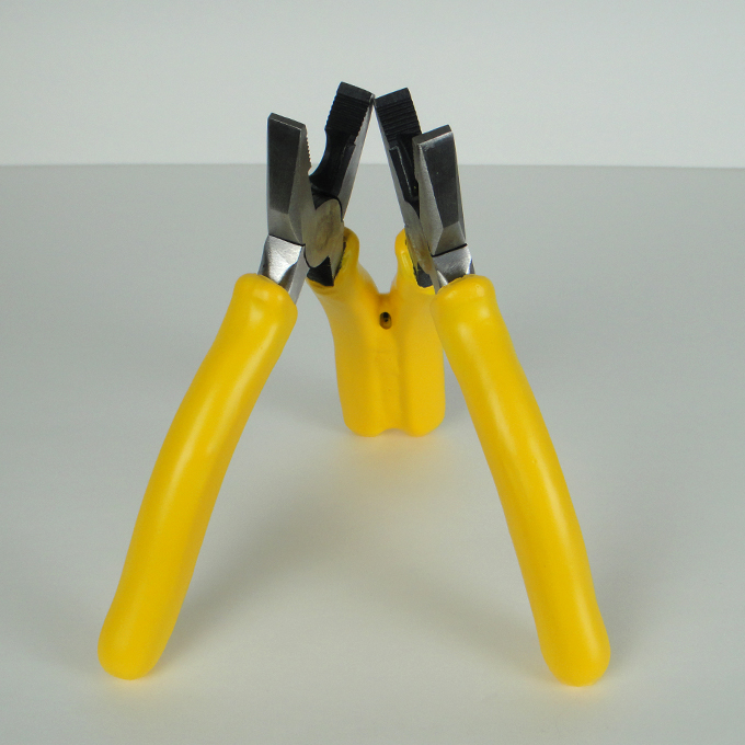 <b>Conjoined</b> (detail)<br>
Modified combination pliers and latex<br>
16 x 17 x 14 cm<br>
2011