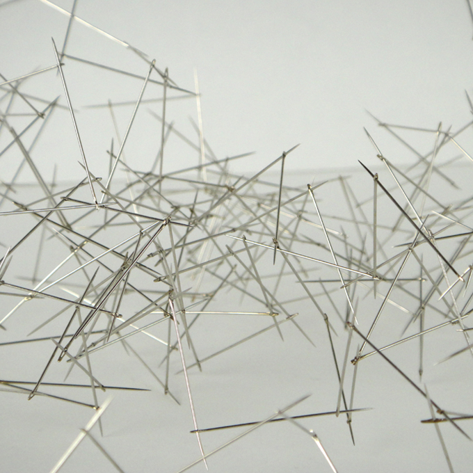 <b>Structure IV</b> (detail)<br>
Needles inserted one into the other<br>
32 x 51 x 27 cm<br>
2011