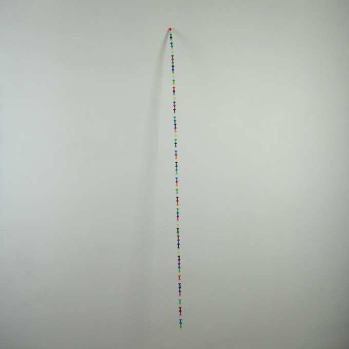 <b>Pin the Tail</b><br>
One box of push pins connected together<br>
80 x 1 x 9 cm<br>
2011