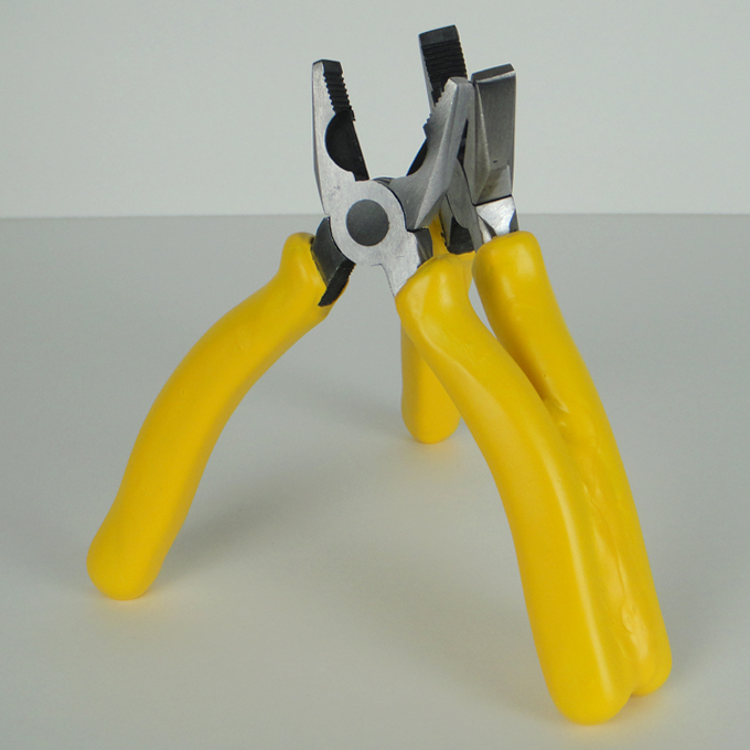 <b>Conjoined</b><br>
Modified combination pliers and latex<br>
16 x 17 x 14 cm<br>
2011